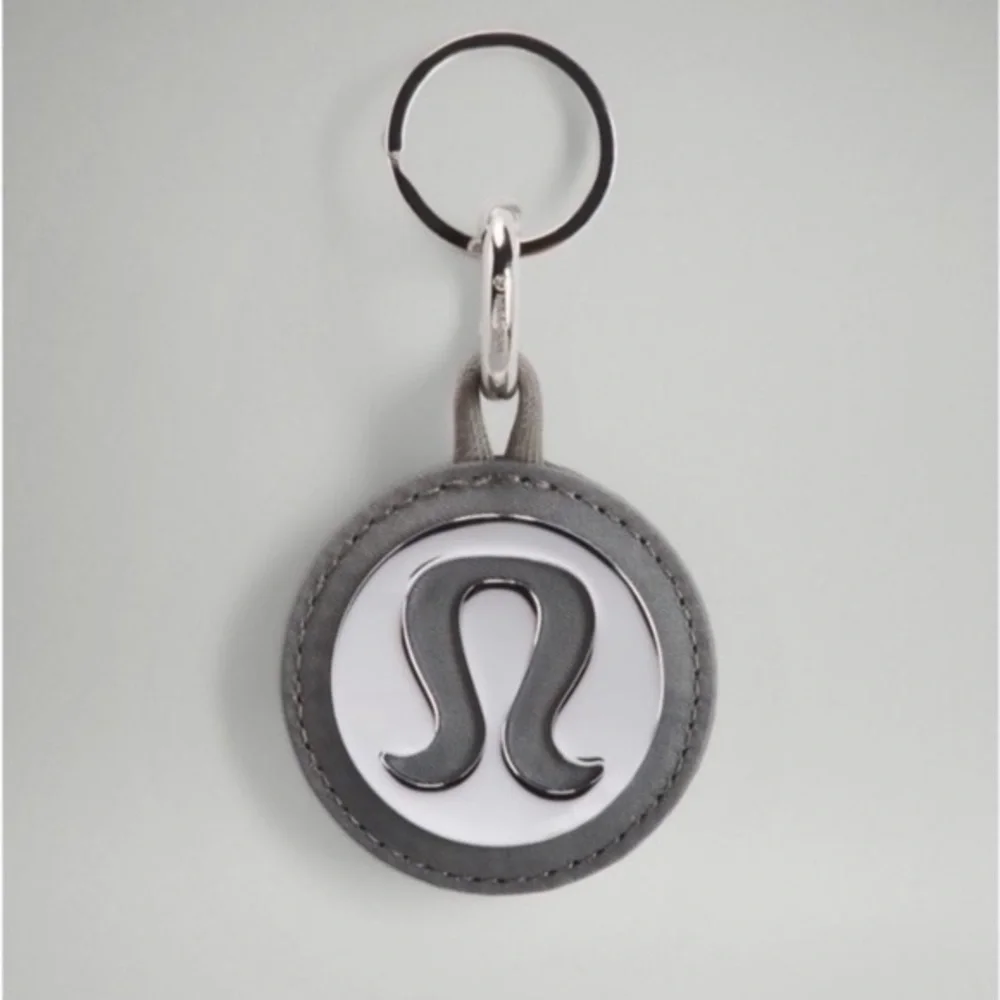NWT Lululemon Unisex Logo Bag Charm & Keychain Silver/Silver Drop